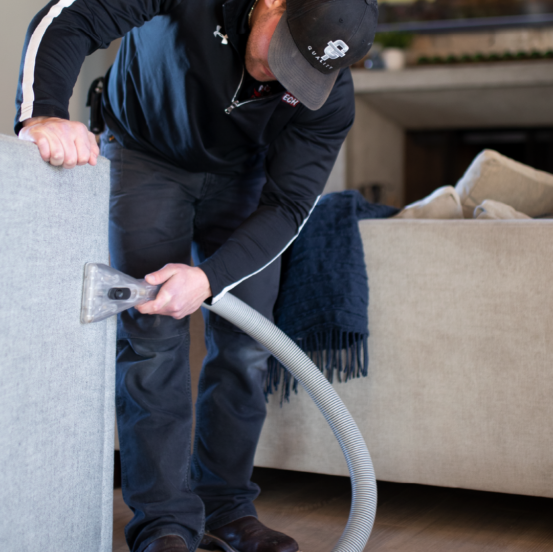 Technician Cleaning back of chair