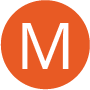 The Letter M inside an Orange Circle