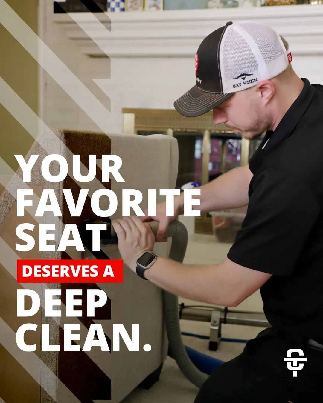 Technician deep cleaning upholstered chair in living room